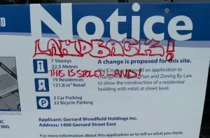 Construction sign with the scribble Landback, this is stolen land