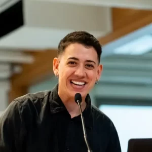 Speaker with short hair at mic